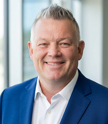 Portrait of Jason Clarke, REALTOR® and Head Coach.